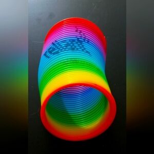 Reliant energy Rainbow Coil slinky Toy - Bright Multicolor Plastic Spring